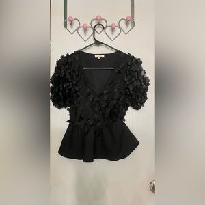 Black floral blouse